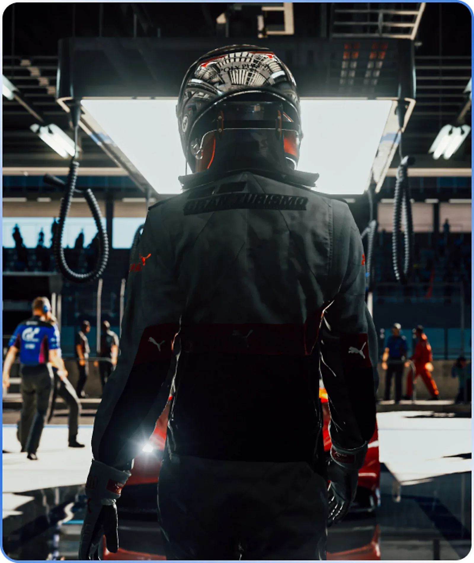 Závodník v boxech ve hře Gran Turismo 7