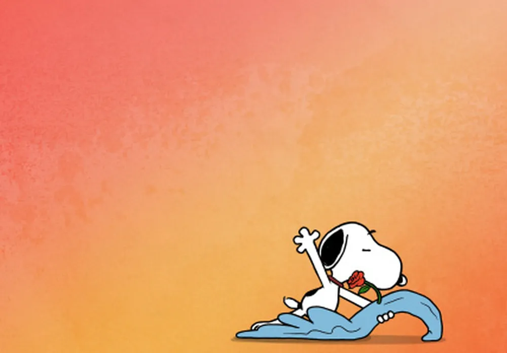 Spořič obrazovky se Snoopym na oranžovém pozadí